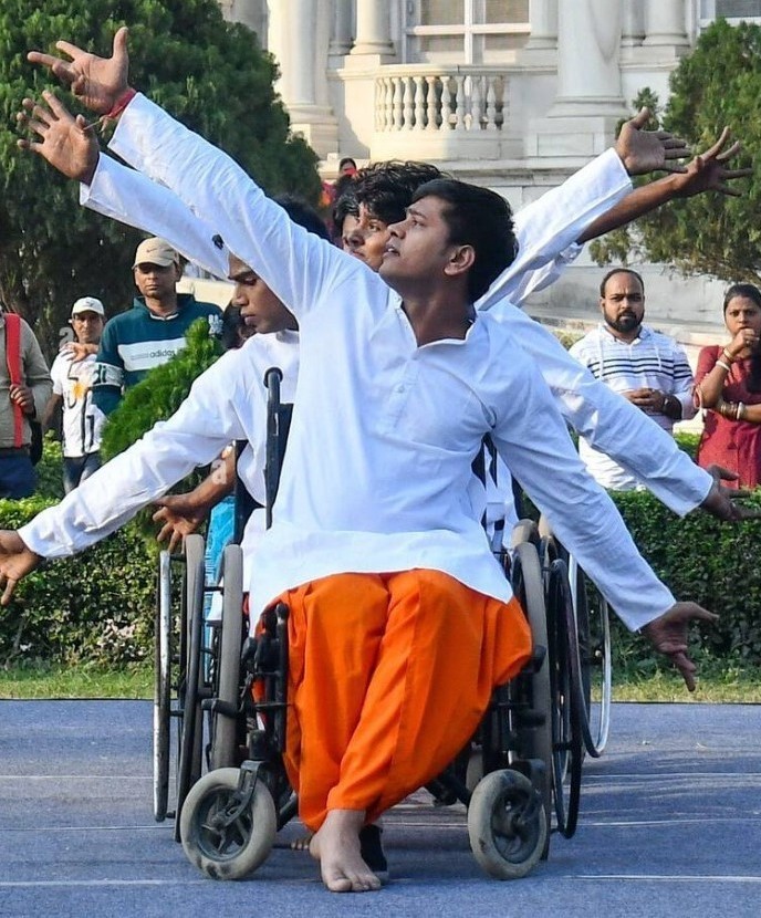 Wheelchair dancers performing on stage during Nav Utthan event Testimonials Image